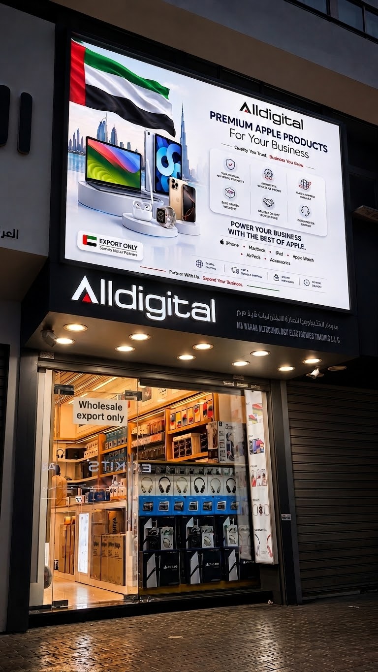 The Alldigital shopfront in Dubai, lit at night